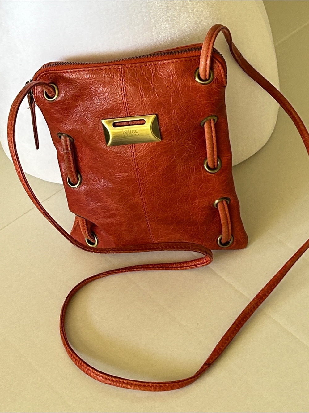 LATICO CRACKLED FULL-GRAIN LEATHER ORANDE-RED CROSSBODY BAG
